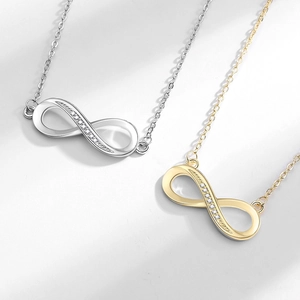 Unendlichkeitssymbol Halskette in Gold und Silber mit Zirkonsteinen an dünner Kette