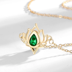 Golden lotus pendant necklace with water-drop green gemstone and hollow petals