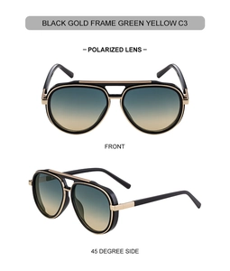 Polarized pilot sunglasses detail with gold frame and green yellow gradient lenses