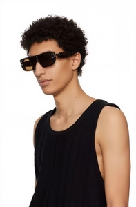 Detail view of stylish square sunglasses featuring black thick frame and silver rivets