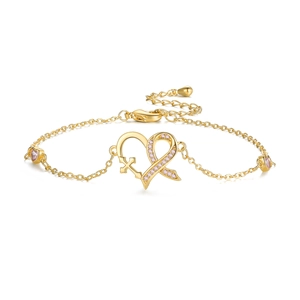 Golden heart bracelet with pink ribbon cross and symmetrical heart-shaped stones