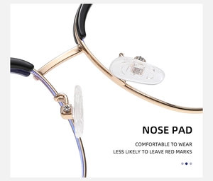 Close-up of golden nose bridge and soft silicone pads on trendy cat-eye glasses frame