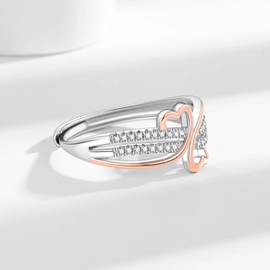 Adjustable two-tone heart ring for women with cubic zirconia inlay in rose gold and silver