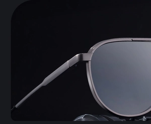 Close-up of durable reinforced hinges and gunmetal finish on aviator sunglasses