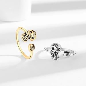 Cartoon snake luck bag open rings in gold and silver finish with adjustable band