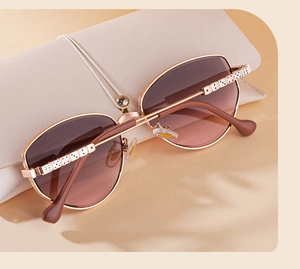 Detailed view of polygon sunglasses with dice decor and brown gradient lenses