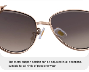 Detailed macro view of adjustable silicone nose pads on rose gold metal frame sunglasses