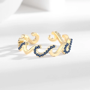 Elegant gold wave-shaped open ring with blue zircon micro-pave setting for women