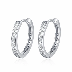 Classic silver hoop earrings with single row clear zircons on white reflective surface