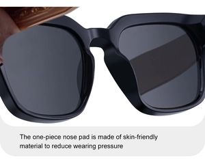 Close-up of matte black sunglasses featuring a comfortable one-piece nose pad design