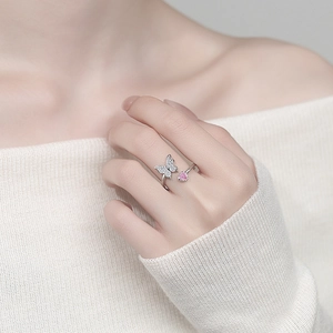 Bague papillon ajustable en argent avec pierre coeur rose et zircons scintillants