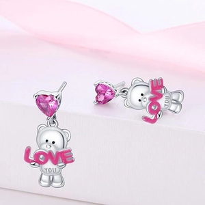 Detail of silver bear earrings with pink heart stone and LOVE YOU letter plate