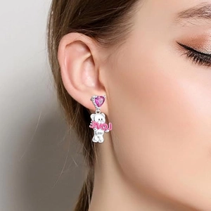 Pink heart crystal and cute white bear LOVE stud earrings shown on model ear