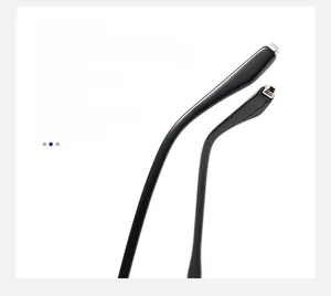Close-up of ergonomic black anti-slip temple tips with silver metal accents for eyewear