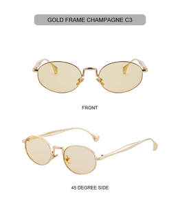 Detailed view of oval vintage sunglasses with gold metal frames and champagne lenses