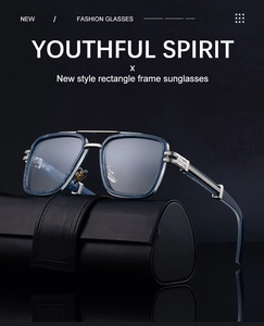 Detail of square frame sunglasses with blue marble pattern and metallic double bridge design