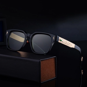 Retro square polarized sunglasses for men with gold filigree temples and green gemstone