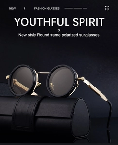 Detailed close-up of retro round polarized sunglasses with vintage gear style gold temples