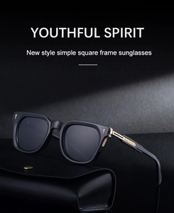 Detail of square sunglasses with gold metal temples next to a black leather case