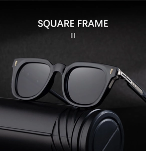 Detail of square polarized sunglasses with metallic accents on polished black frames