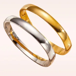 Polished 8mm minimalist stainless steel bangles in gold and silver finish