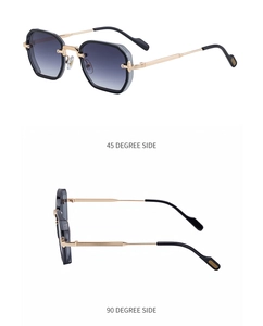 Detail view of square punk sunglasses with gradient lenses and gold metal temples