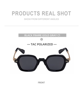 Close-up of square black frame sunglasses with TAC polarized lenses and gold metal temples