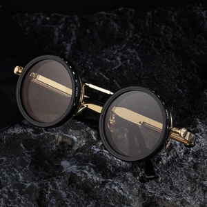 Retro steampunk polarized round sunglasses with black frames and gold spring temples