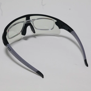 Detail of cycling sunglasses with a dual-layer frame and removable inner myopia insert