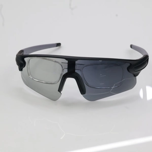 Detail view of photochromic sports sunglasses showing light transition lens and half-frame