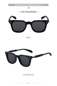 Macro view of matte black square frames and polarized gray lenses with gold hardware