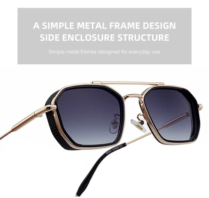 Close-up of golden metal frame steampunk sunglasses with black mesh side shields and grey lenses