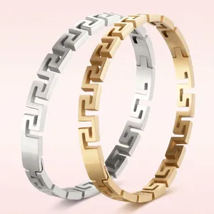 Bracelets en acier titane avec motifs grecs classiques en finitions or et argent