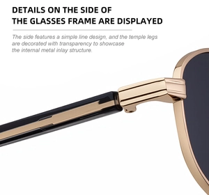 Detailed view of golden metal hinges and transparent acetate temples on oval sunglasses