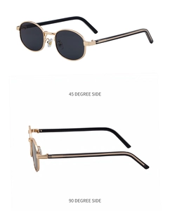 Detailed side views of oval metal sunglasses with gold frames and grey lenses