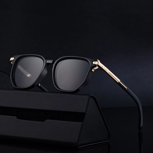 Mens polygon sunglasses with zinc alloy temples and black square frame on a luxury case