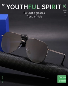 Detail shot of aviator polarized sunglasses on a carbon fiber stand with dual bridge frame
