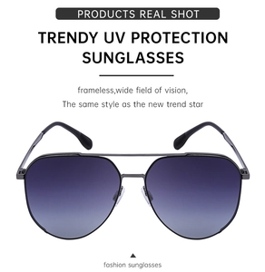 Detail of frameless polarized aviator sunglasses with UV protection and metal temples