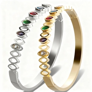 Bracelets élégants en acier titane or et argent avec incrustation de pierres multicolores
