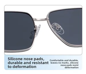 Close-up of soft silicone nose pads and silver metal bridge on square polarized sunglasses