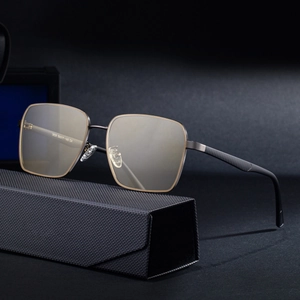 Square polarized nylon sunglasses for men with dark gray frame and golden edge details