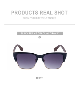 Front view of cat-eye sunglasses with wood grain temples and gradient grey lenses