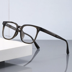 2025 retro square frame optical glasses for men in transparent grey with metal rivets