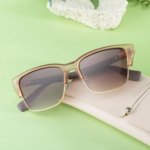 Brown gradient cat-eye sunglasses with wood grain temples and beige leather pouch
