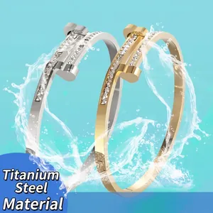 Bracelet clou en acier titane avec incrustation de cristaux, doré et argenté