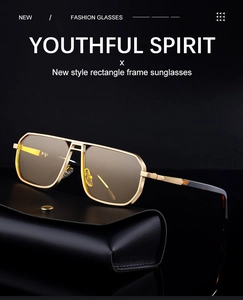 Detail of vintage square metal sunglasses with gold frame and premium leather case