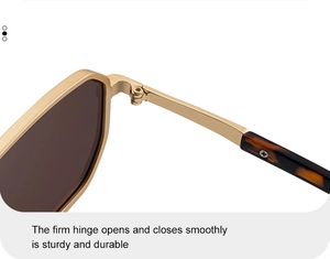Macro detail of high-quality metal hinges and brown lenses on square sunglasses