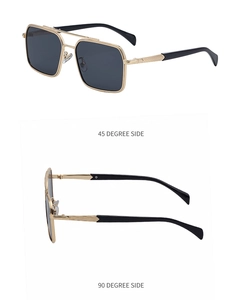 Detail of square sunglasses with gold metal double bridge and textured temple arms