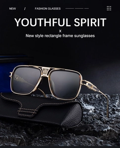 Detail of square gold metal sunglasses frame with textured bridge and leather case