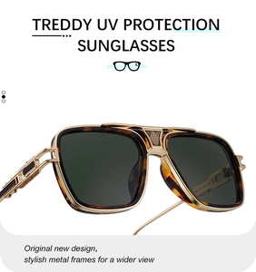 Close-up of tortoise square sunglasses with gold metal temples and UV protection